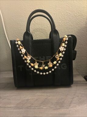 Pearl & Shell Chain Along With Hawaiian Pikake and Crown Flowers